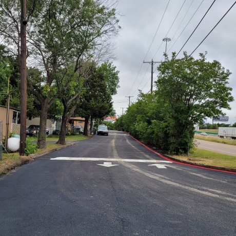 road alongside manufactured home community